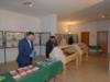 Bacheche con le collezioni esposte e visitatori 